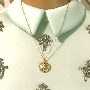 Chanel button authentic turned into a pendant neck